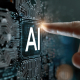Finger touching AI on circuit board
